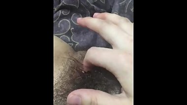 FTM masturbates hairy cunt