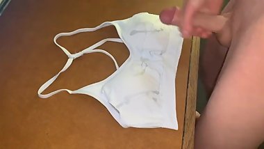 Cumming on a white sports bra