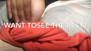 Young girl playing with her big lightskin boobs