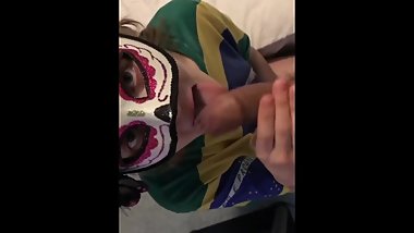 Masked Vixen gives teasing blowjob